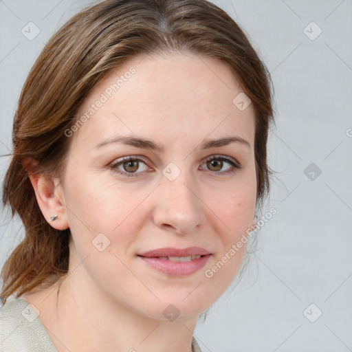 Joyful white young-adult female with medium  brown hair and blue eyes