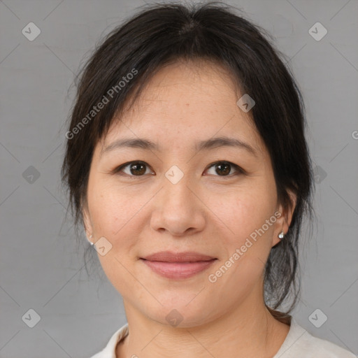 Joyful white adult female with medium  brown hair and brown eyes