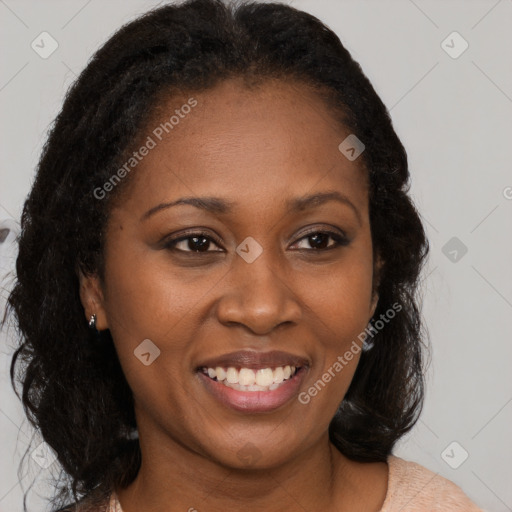 Joyful black young-adult female with medium  brown hair and brown eyes