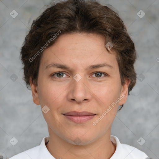 Joyful white adult female with short  brown hair and grey eyes