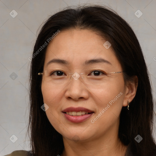 Joyful white adult female with medium  brown hair and brown eyes