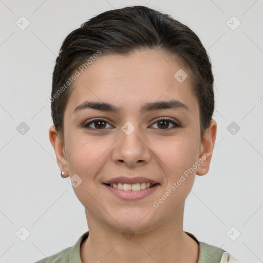 Joyful white young-adult female with short  brown hair and brown eyes