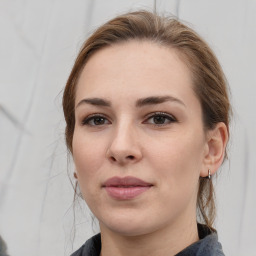 Neutral white young-adult female with medium  brown hair and grey eyes