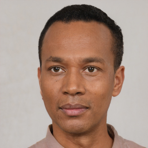 Neutral latino adult male with short  black hair and brown eyes
