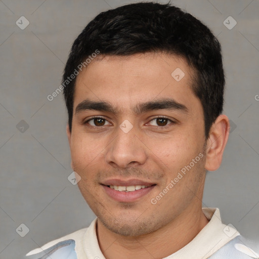 Joyful white young-adult male with short  black hair and brown eyes