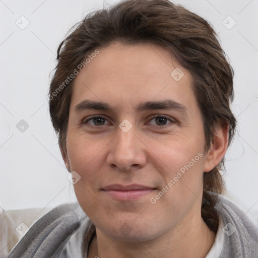 Joyful white young-adult male with medium  brown hair and brown eyes