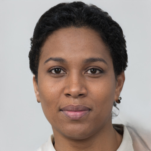 Neutral black young-adult female with short  black hair and brown eyes