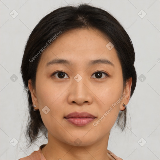 Joyful asian young-adult female with medium  brown hair and brown eyes