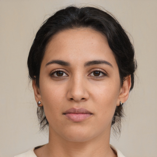 Neutral latino young-adult female with medium  brown hair and brown eyes