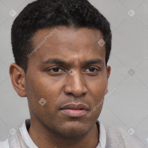 Neutral latino young-adult male with short  brown hair and brown eyes