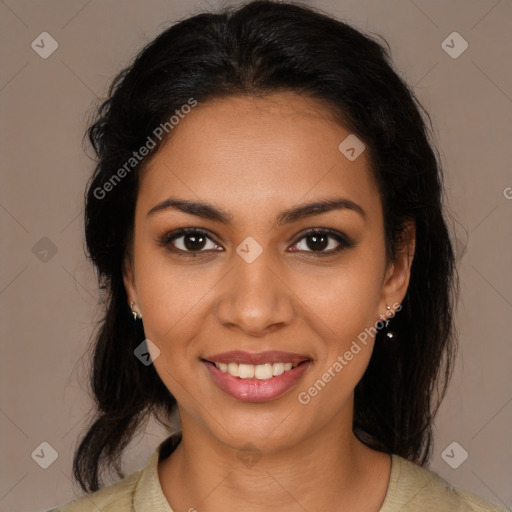 Joyful latino young-adult female with long  brown hair and brown eyes