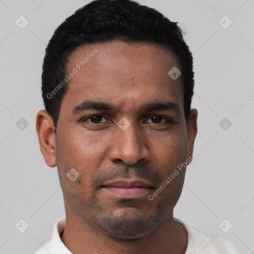 Neutral latino young-adult male with short  black hair and brown eyes