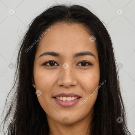 Joyful latino young-adult female with long  brown hair and brown eyes