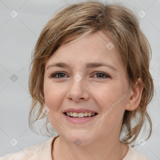 Joyful white young-adult female with medium  brown hair and brown eyes