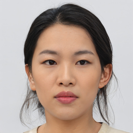 Neutral asian young-adult female with medium  black hair and brown eyes