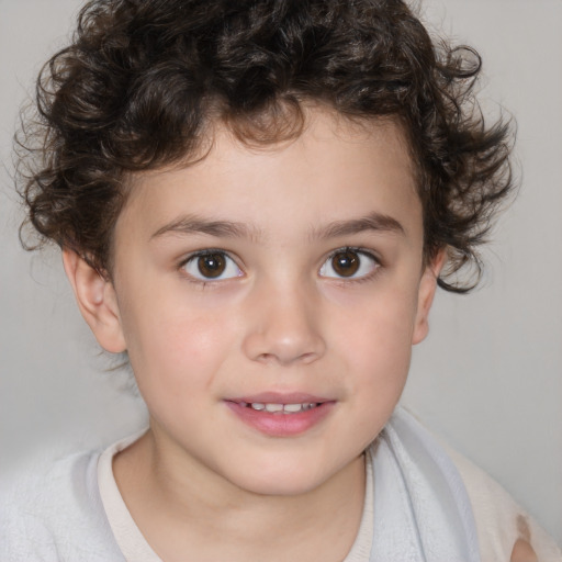 Joyful white child male with short  brown hair and brown eyes