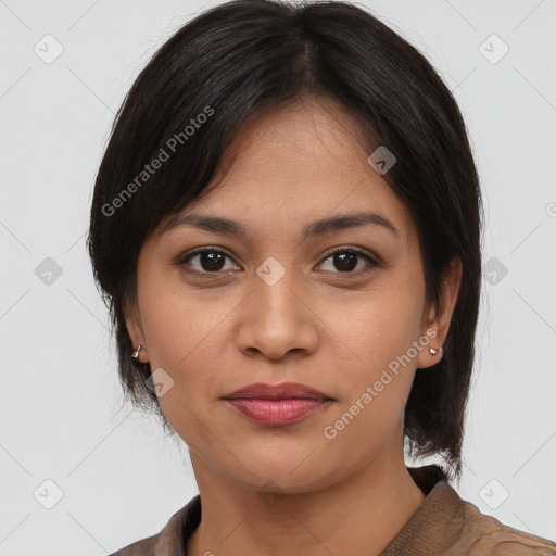 Joyful latino young-adult female with medium  brown hair and brown eyes