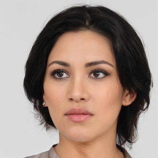 Neutral asian young-adult female with medium  black hair and brown eyes