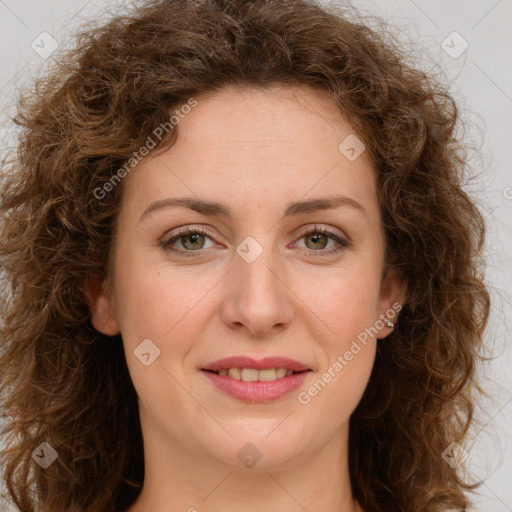 Joyful white young-adult female with long  brown hair and green eyes