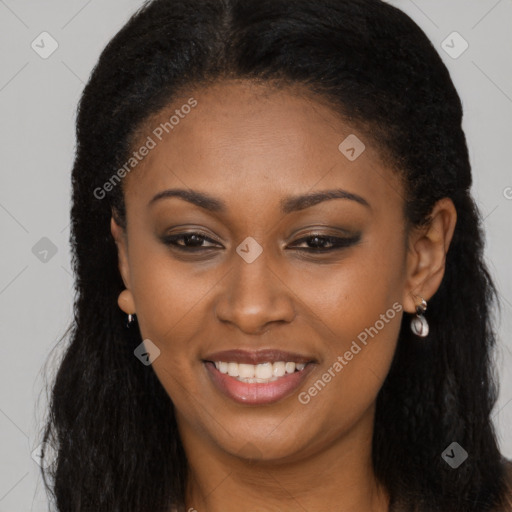 Joyful black young-adult female with long  brown hair and brown eyes