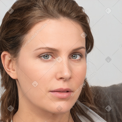 Neutral white young-adult female with medium  brown hair and grey eyes