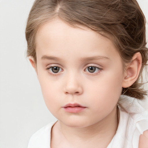 Neutral white child female with medium  brown hair and brown eyes