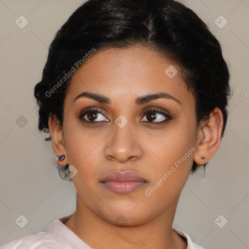 Joyful latino young-adult female with short  black hair and brown eyes