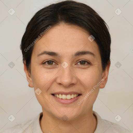 Joyful white adult female with short  brown hair and brown eyes