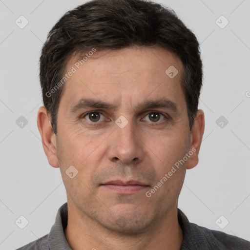 Neutral white adult male with short  brown hair and brown eyes