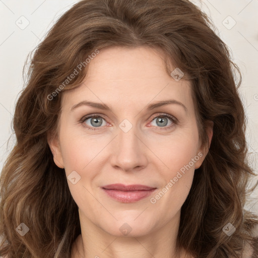 Joyful white young-adult female with long  brown hair and green eyes