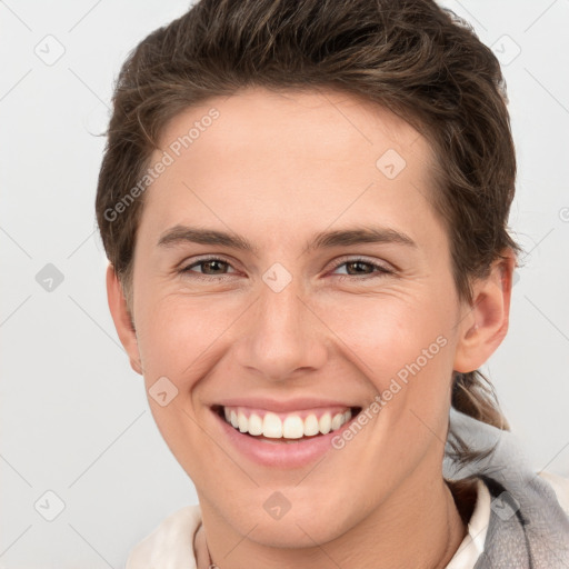 Joyful white young-adult female with short  brown hair and grey eyes