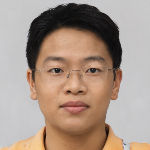 Neutral asian young-adult male with short  brown hair and brown eyes