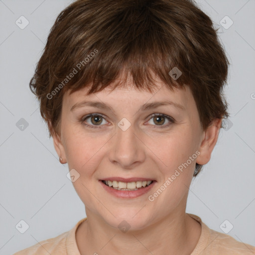 Joyful white young-adult female with short  brown hair and grey eyes