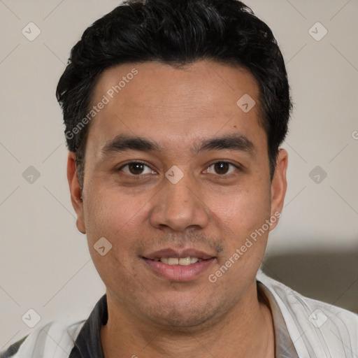 Joyful white young-adult male with short  black hair and brown eyes