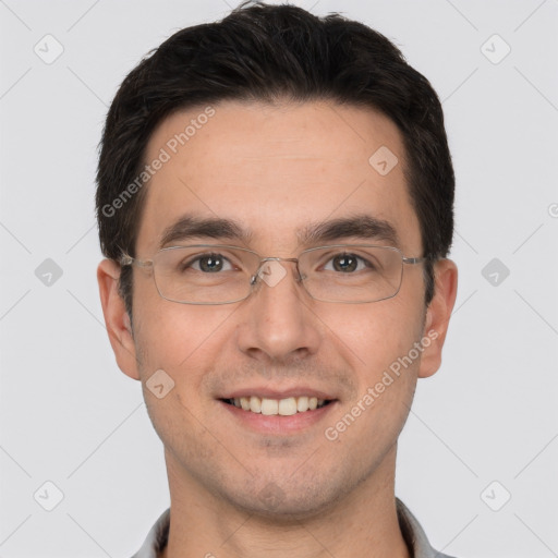 Joyful white young-adult male with short  black hair and brown eyes