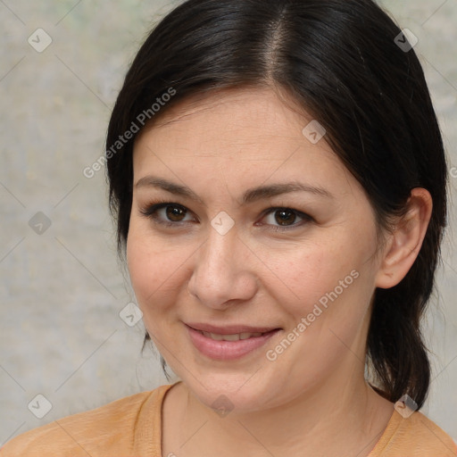 Joyful white adult female with medium  brown hair and brown eyes