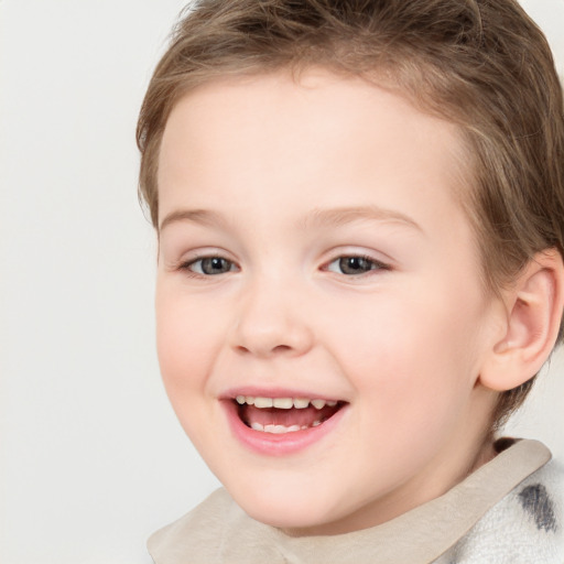 Joyful white child female with short  brown hair and brown eyes