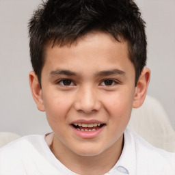 Joyful white child male with short  brown hair and brown eyes