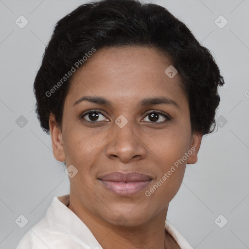 Joyful black adult female with short  brown hair and brown eyes