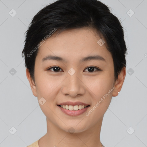 Joyful asian young-adult female with short  brown hair and brown eyes