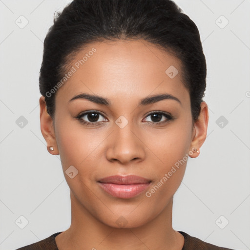 Joyful latino young-adult female with short  black hair and brown eyes