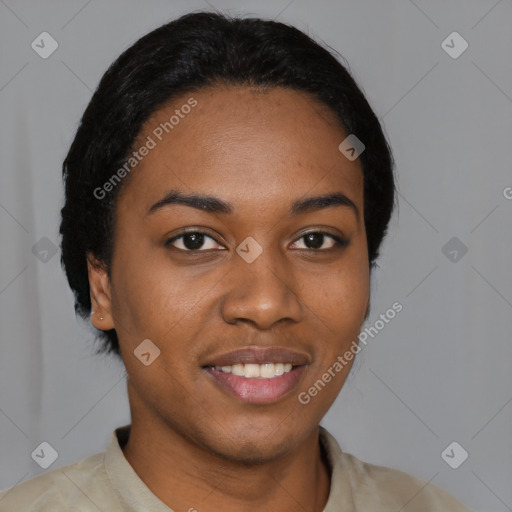 Joyful black young-adult female with short  black hair and brown eyes
