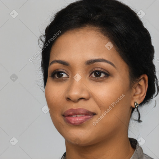 Joyful latino young-adult female with long  brown hair and brown eyes