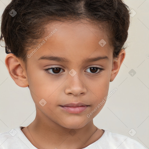 Joyful white child female with short  brown hair and brown eyes