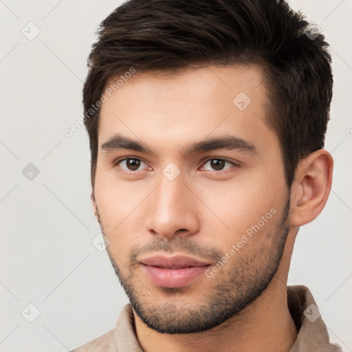 Neutral white young-adult male with short  brown hair and brown eyes