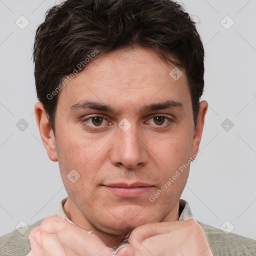 Neutral white young-adult male with short  brown hair and grey eyes