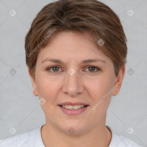 Joyful white young-adult female with short  brown hair and grey eyes