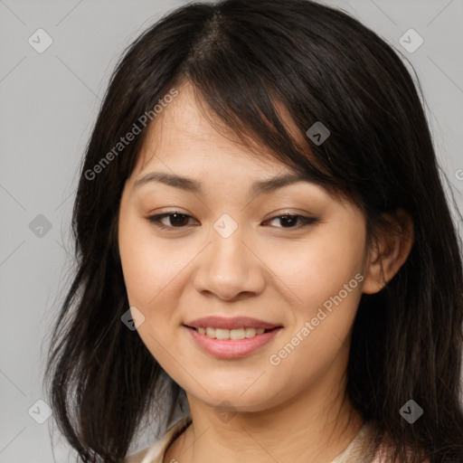 Joyful asian young-adult female with long  brown hair and brown eyes