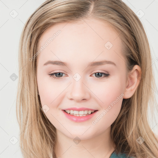 Joyful white young-adult female with long  brown hair and blue eyes