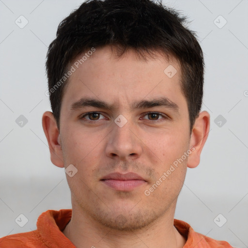 Neutral white young-adult male with short  brown hair and brown eyes